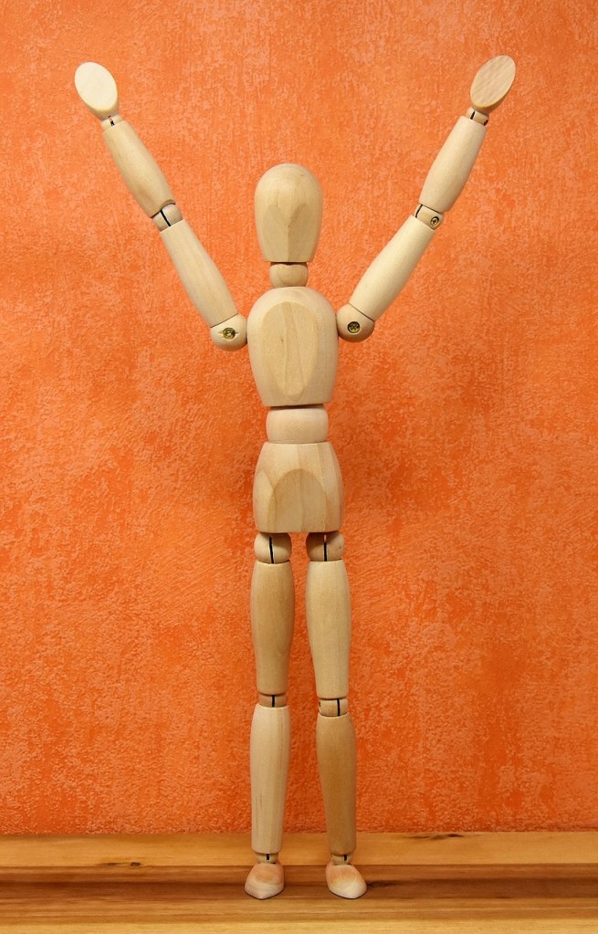 Image: Art mannequin in victory pose